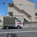 川口市のマンション（積地）と赤帽松本運送トラック